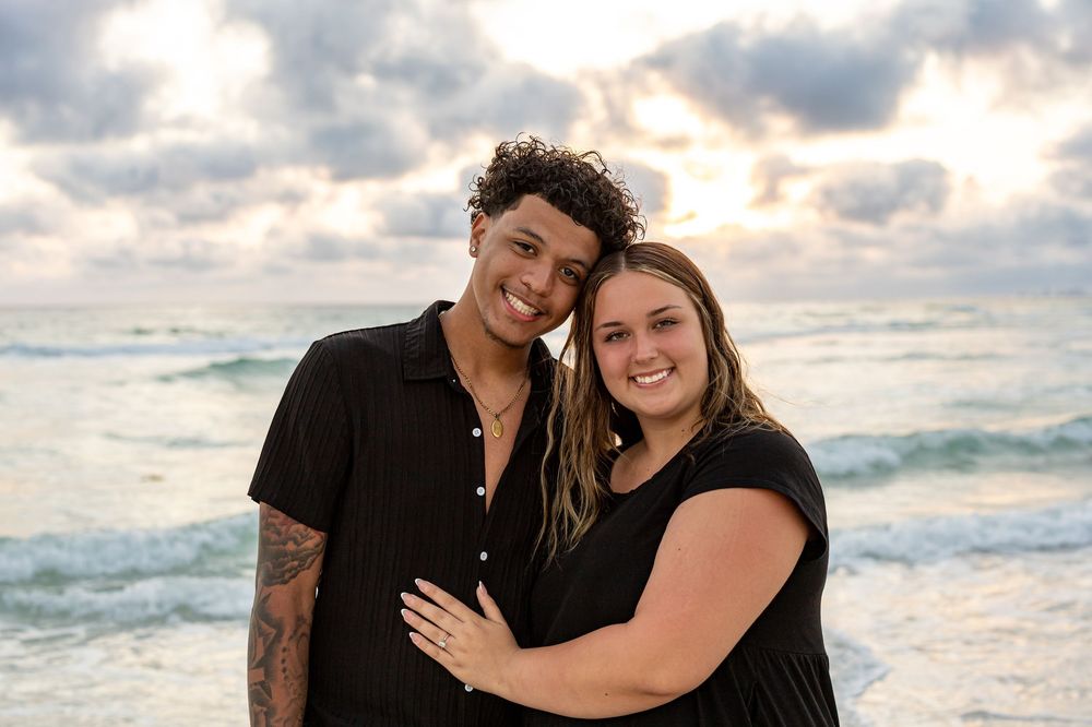 Couple embracing at sunset on Panama City Beach